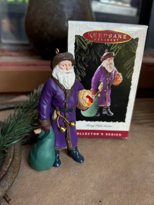 Decorative Nostalgic Santa Claus Ornament in a rich purple attire