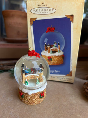 Keepsake ornament with a miniature scene on a cardboard box