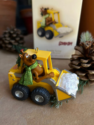 Beloved Scooby Doo drving around in a bobcat and getting ready for the holiday season