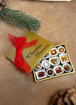 Box of chocolates with a red ribbon labeled 'Chocolate Treasures' a nostalgic design keepsake ornament