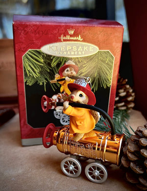 Firefighter Squirrel riding a water tank, adorable-themed ornament from the Hallmark Keepsake North Pole Reserve 