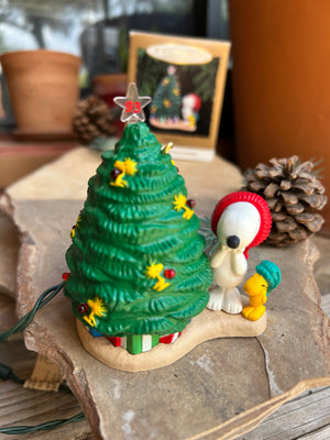Peanuts gang Snoopy and Woodstock Decorative keepsake ornaments with blinking lights on a christmas tree