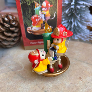 flame fighting mice firefighters dousing a candlestick vintage ornament from the 1999 Hallmark collection