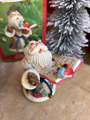 Toy Shop serenade Decorative Christmas ornament of a Santa Claus caroling  with a book of carols, gift idea keepsake hallmark ornament